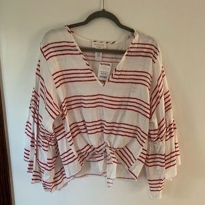 White and red striped. Tie at front